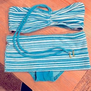 A Juicy Couture Vintage bikini. Top is large and bottoms are small.